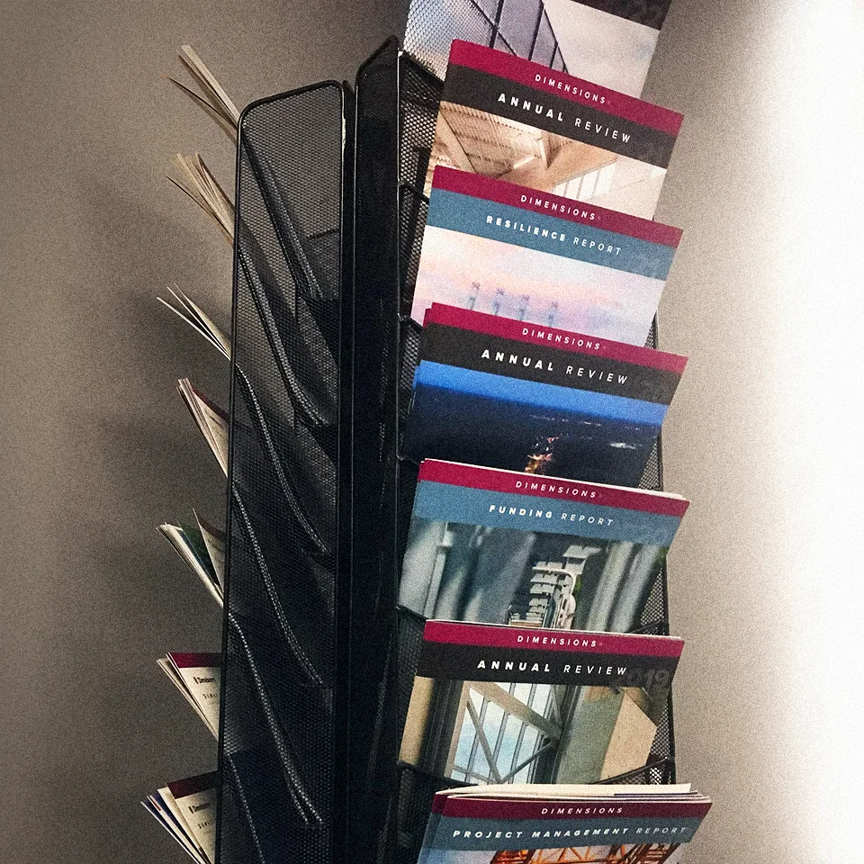 Stephen-Bushey_Dimensions-Magazine-in-Office-On-Rack